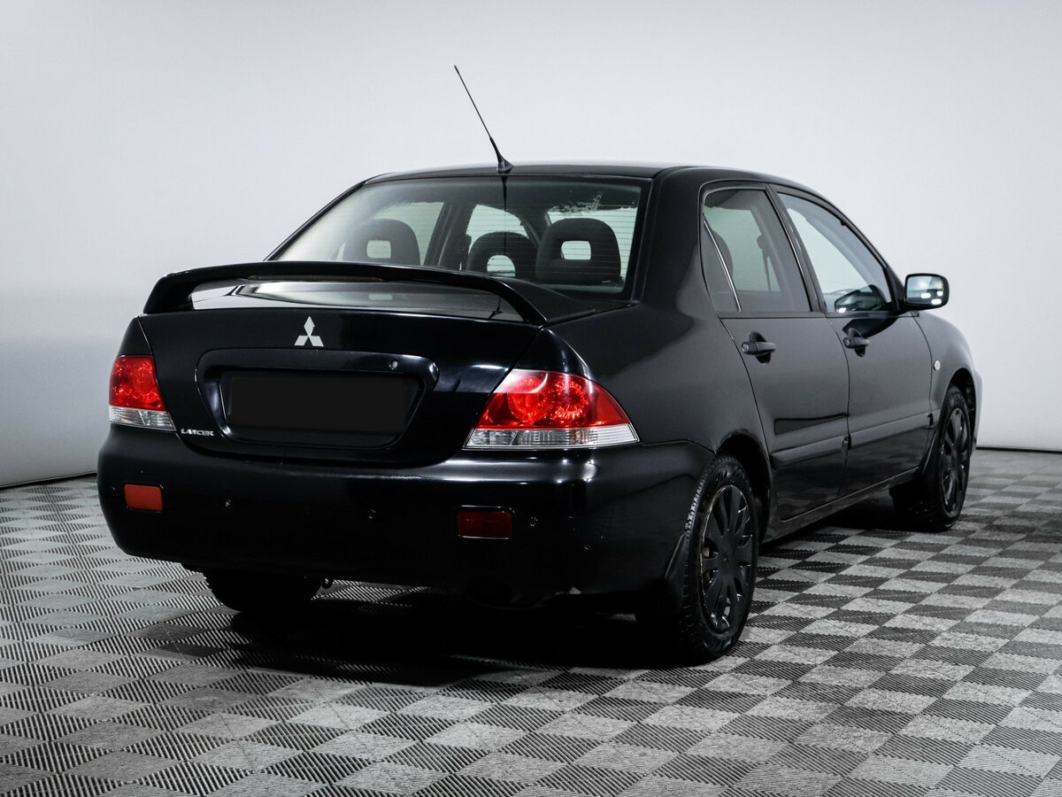 Купить Mitsubishi Lancer IX Рестайлинг, 2009, 356 742 км, фото №4